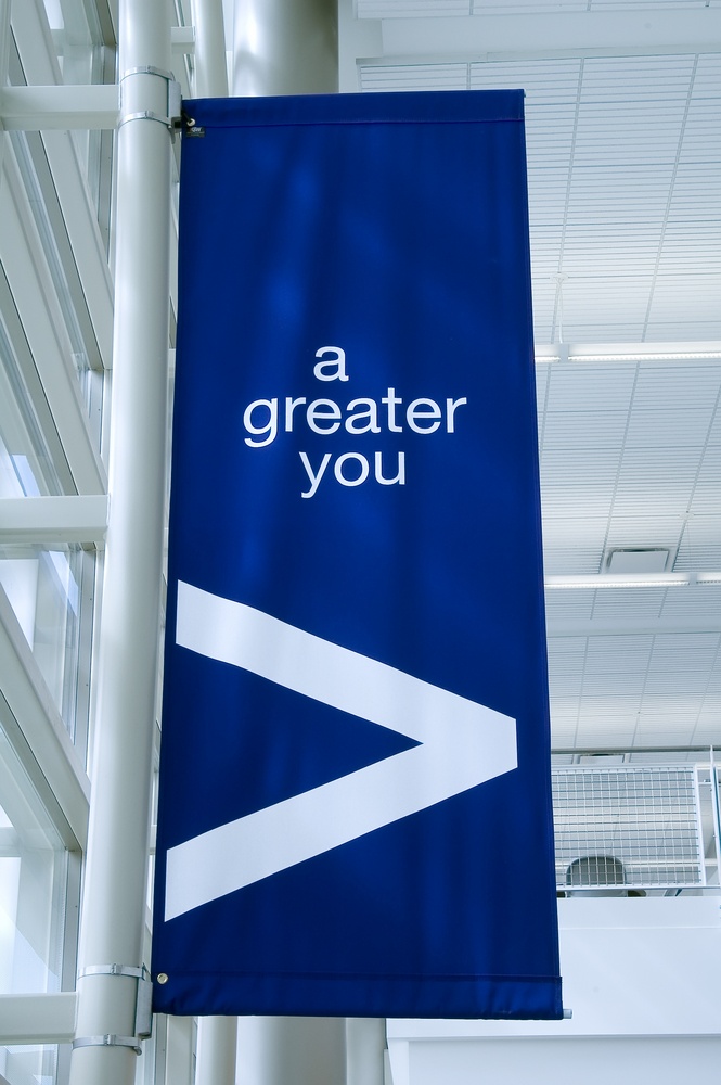 Banner in college hallway "a greater you"