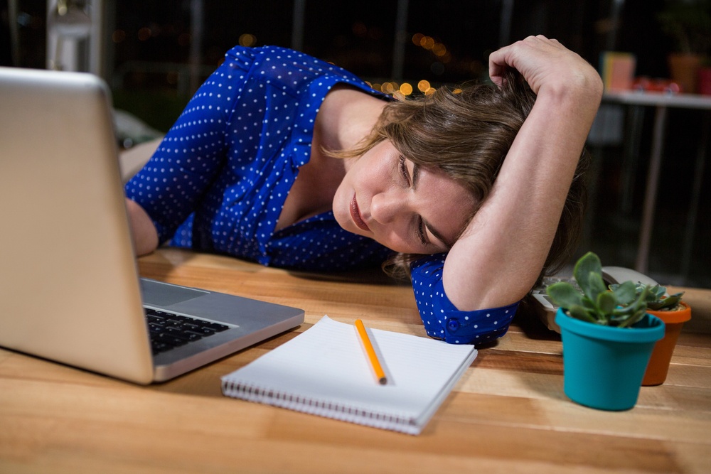 Businesswoman working on laptop in the office