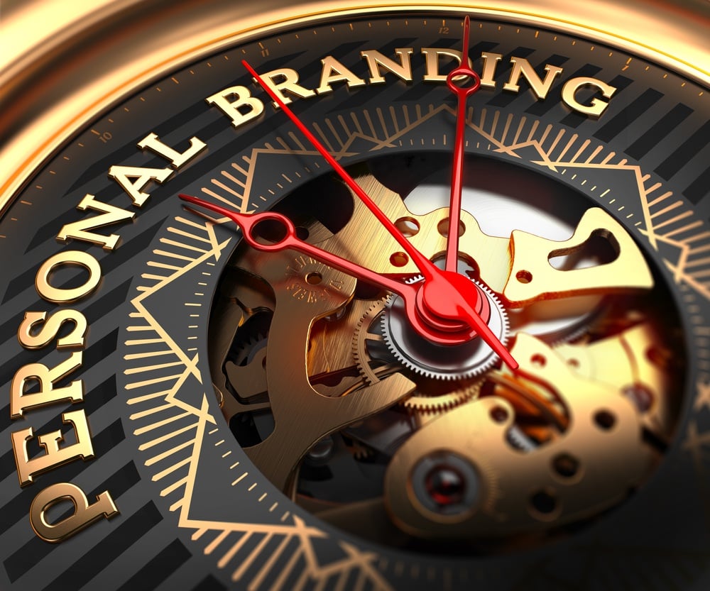 Personal Branding on Black-Golden Watch Face with Closeup View of Watch Mechanism.