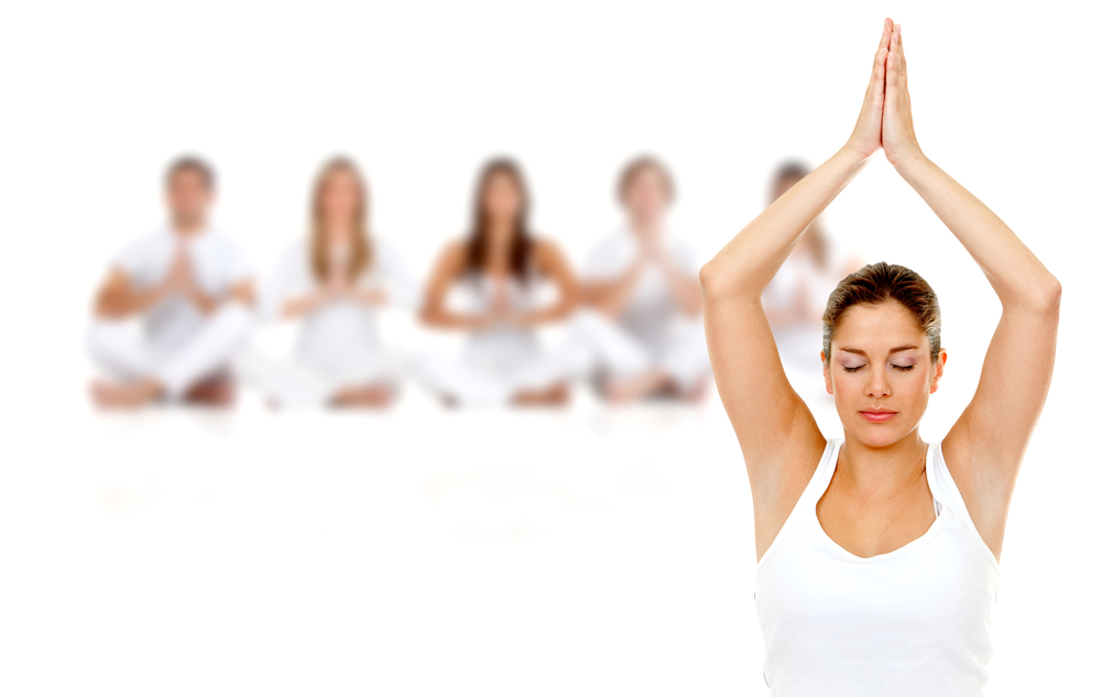 Group of people practicing yoga isolated over a white background
