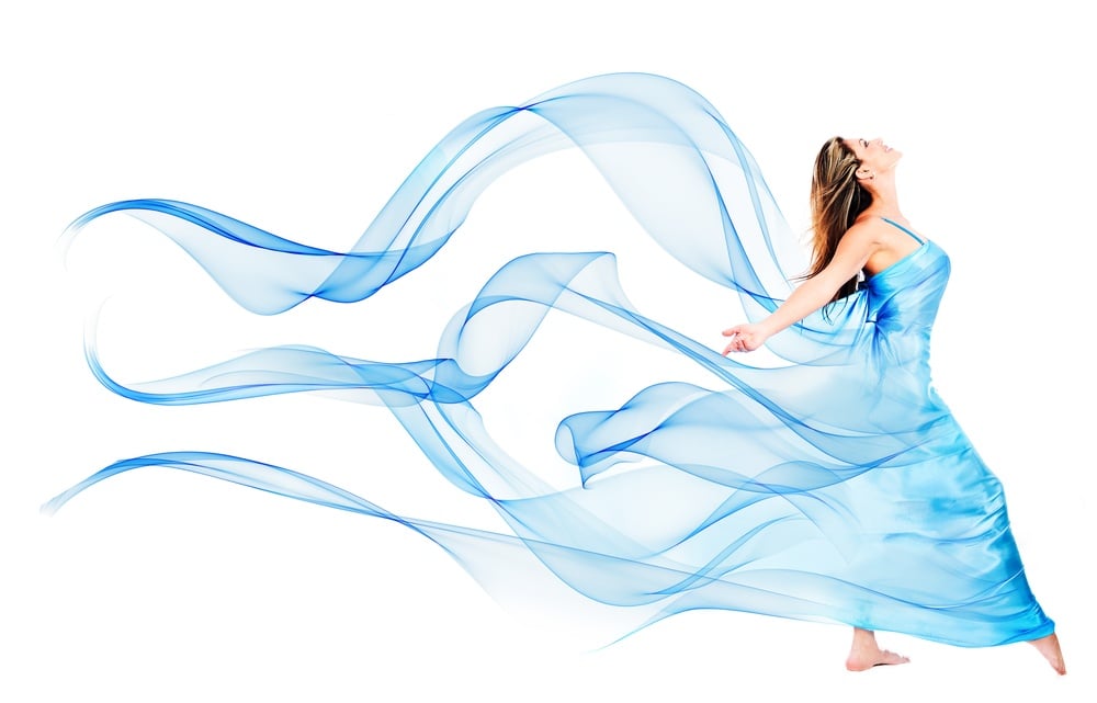Woman in a beautiful blue dress - isolated over a white background